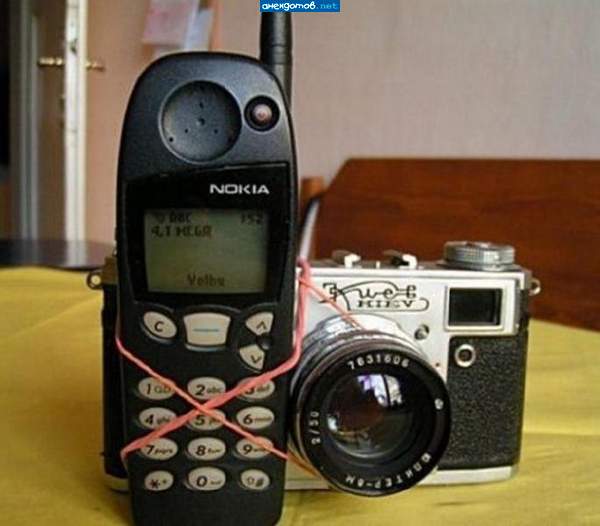 Продам сотовый телефон б/у с фотокамерой"